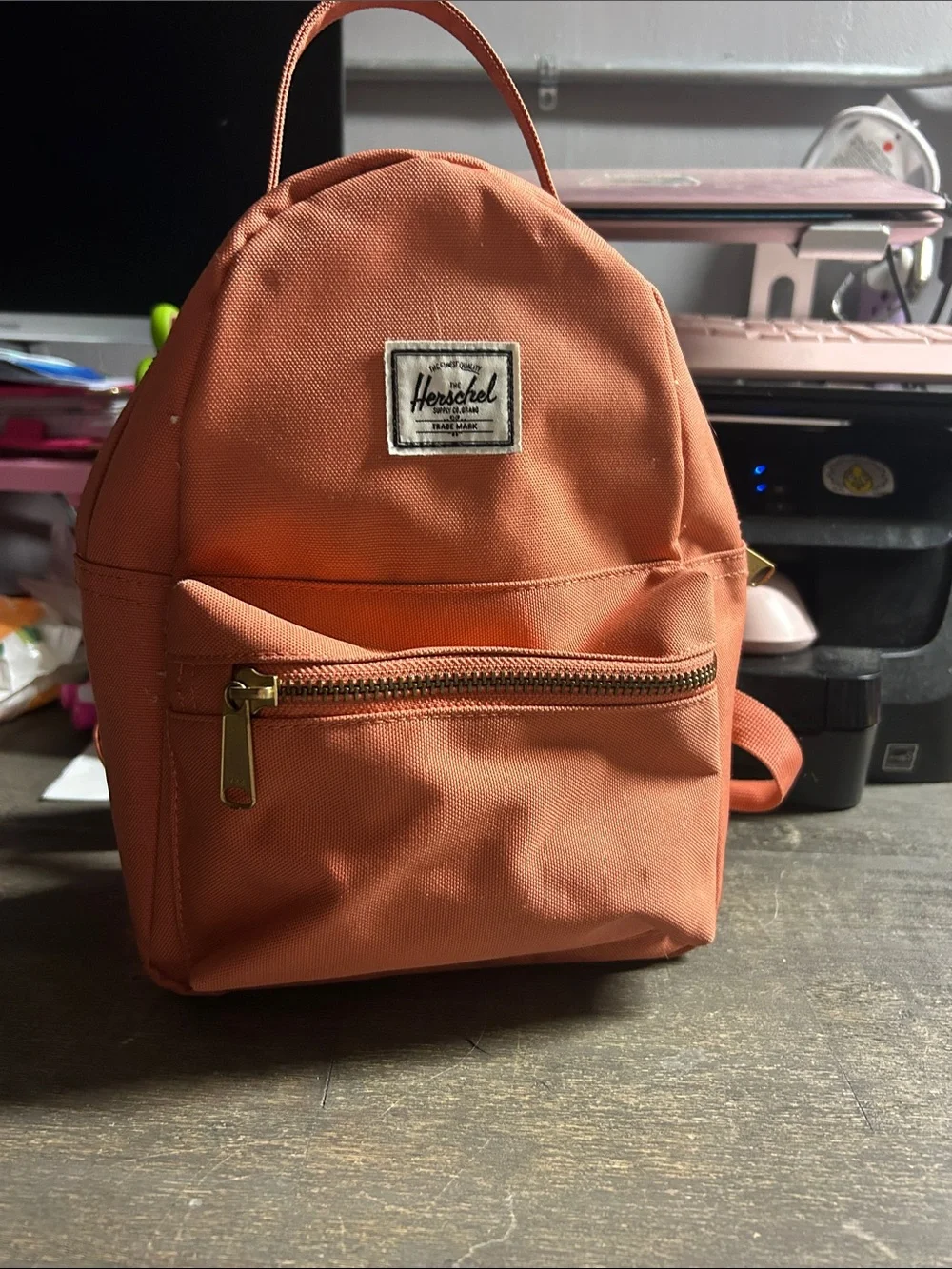 This coral-pink Herschel Nova Mini Backpack